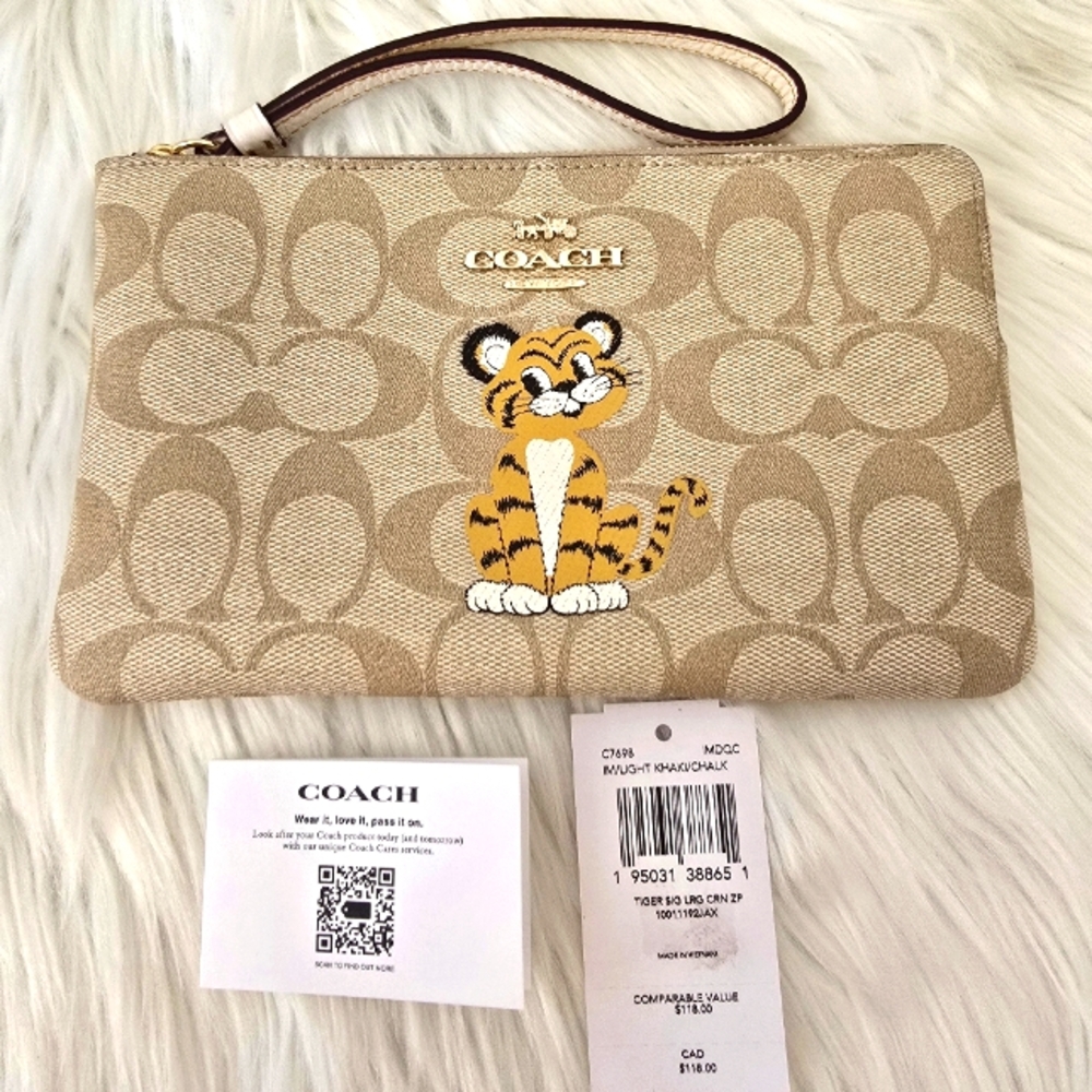 Coach Large Corner Zip Wristlet In Signature Canvas With Tiger C7698